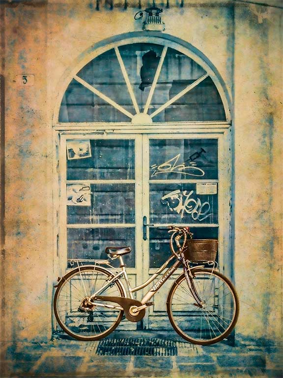 Bicycle-by-a-close-down-shop